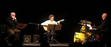 foto concerto con tre musicisti